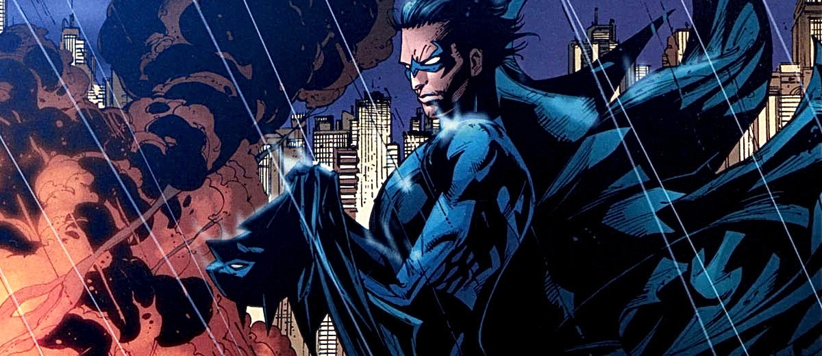 Nightwing държи маската на Батман, докато Готъм е в пламъци