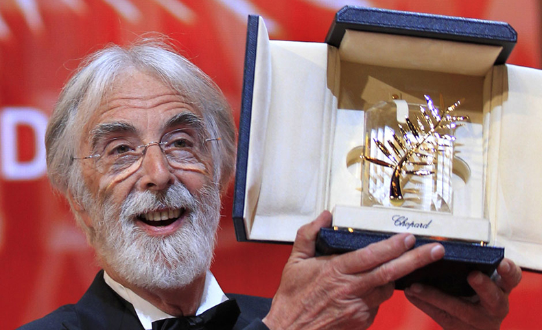 Director Michael Haneke reacts after receiving the Palme d'Or award for the film "Amour" (Love) during the awards ceremony of the 65th Cannes Film Festival, May 27, 2012. REUTERS/Yves Herman (FRANCE - Tags: ENTERTAINMENT)